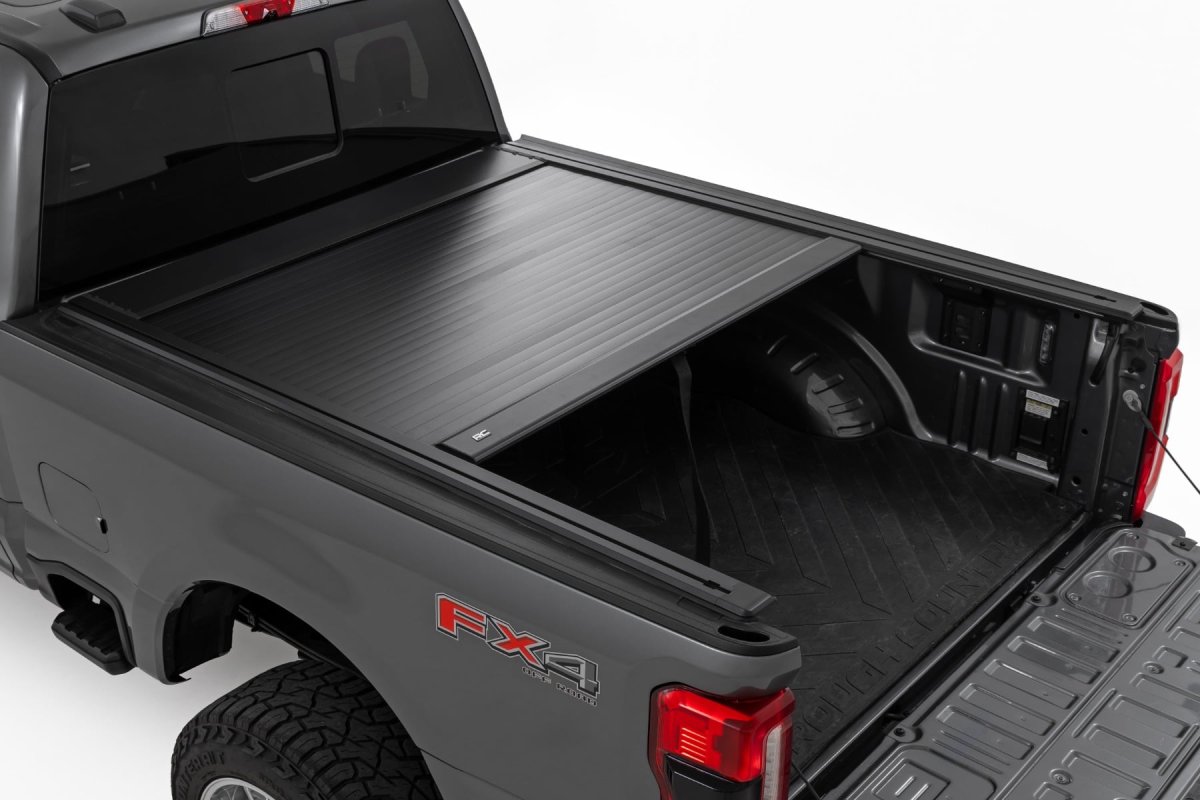 Ford F-350 Super Duty Manual Retractable Bed Cover - Rough Country - Heavy-Duty Aluminum with Smooth Spring-Assisted Retraction - Matte Black - '17-'26